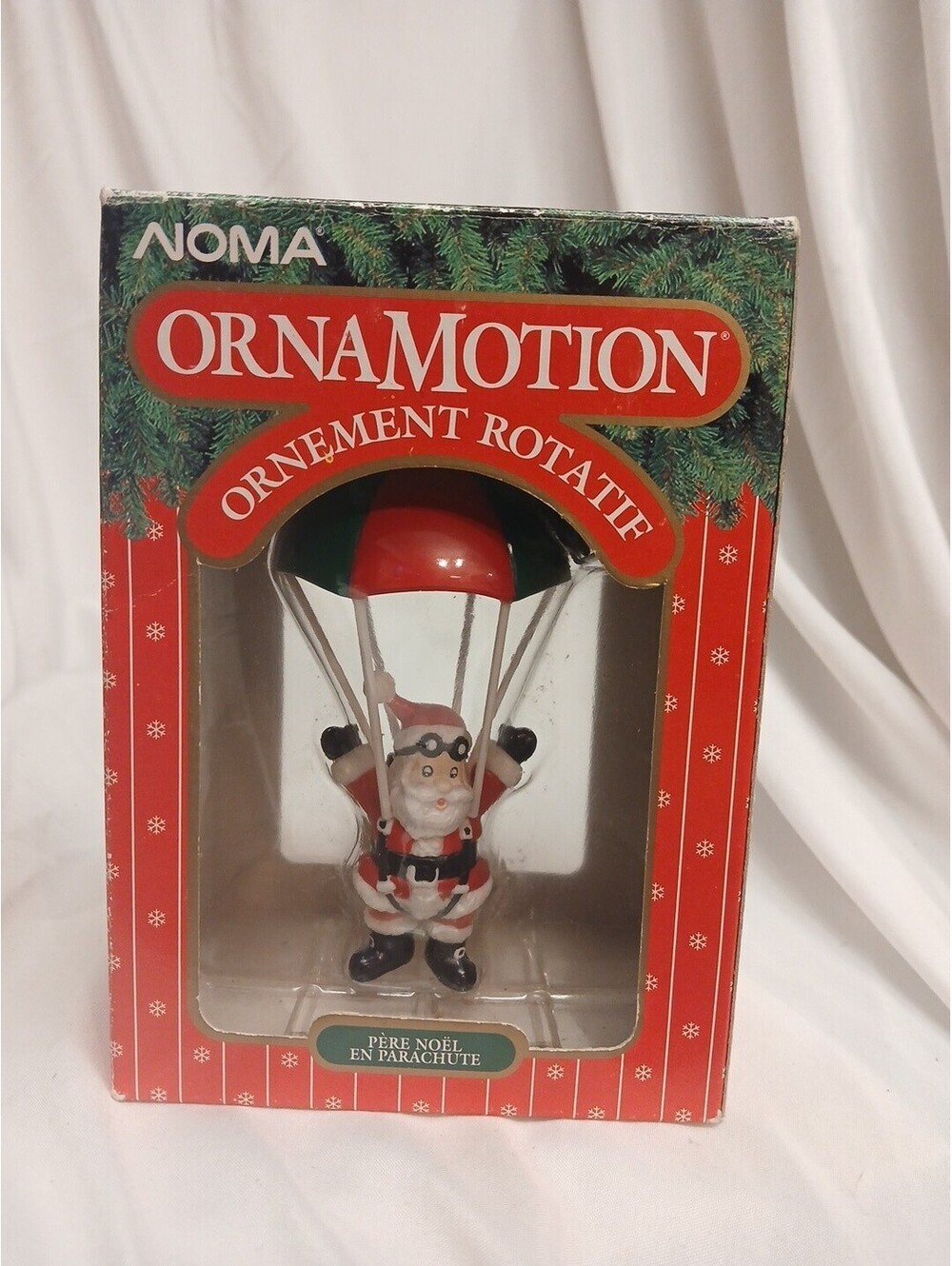 Vntg. 1989 Noma OrnaMotion Parachuting Santa Rotating Ornament
